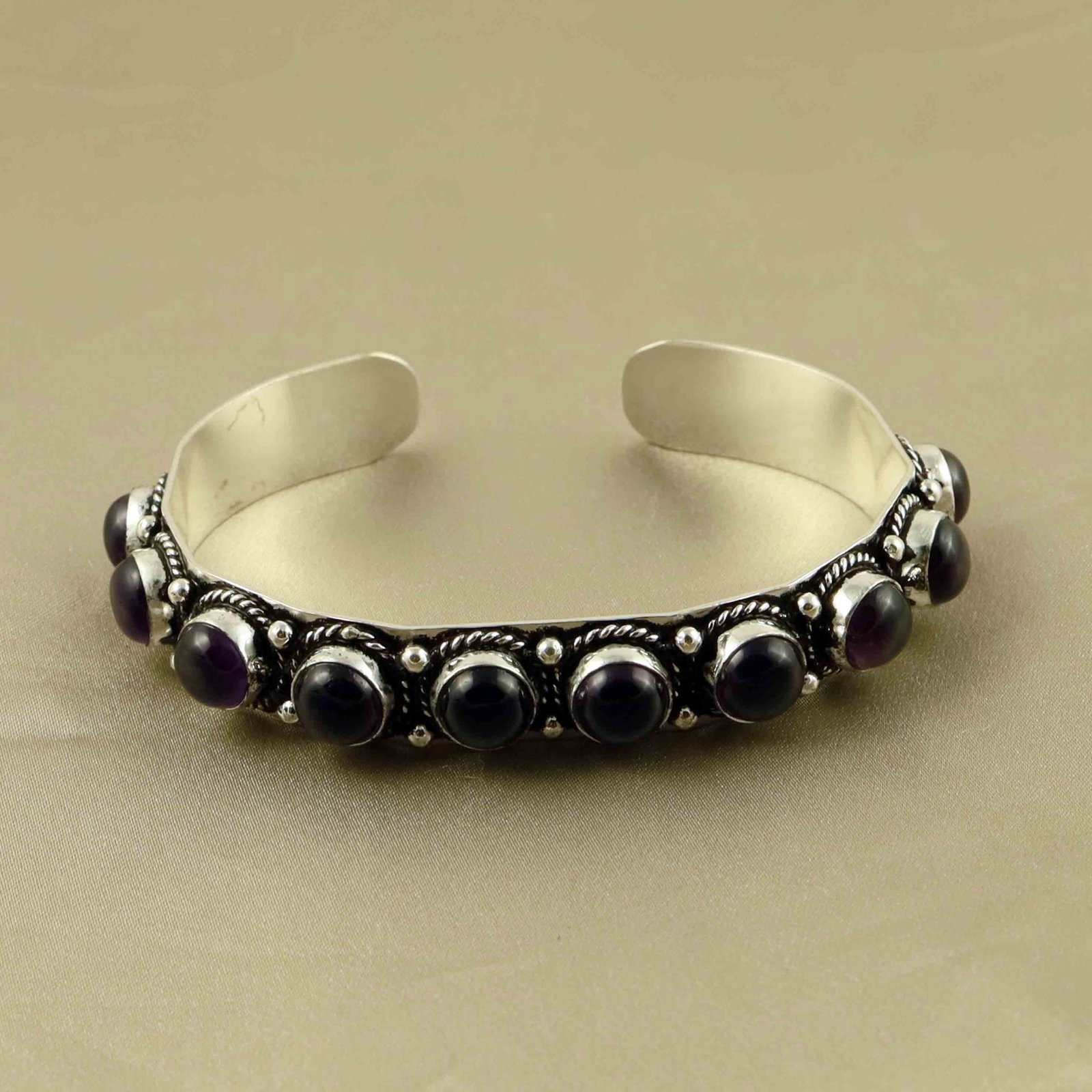 Natural Amethyst Sterling Silver Plated Handmade Cuff Bangle: Product ID: 260607171439 Product - Handmade Silver Plated Cuff Bangle Metal - 92.5 Sterling Silver Plated Bangle Size - 6x5.5 CM (Adjustable) Gemstone - Amethyst Gemstone Origin - Brazil Gemstone Size