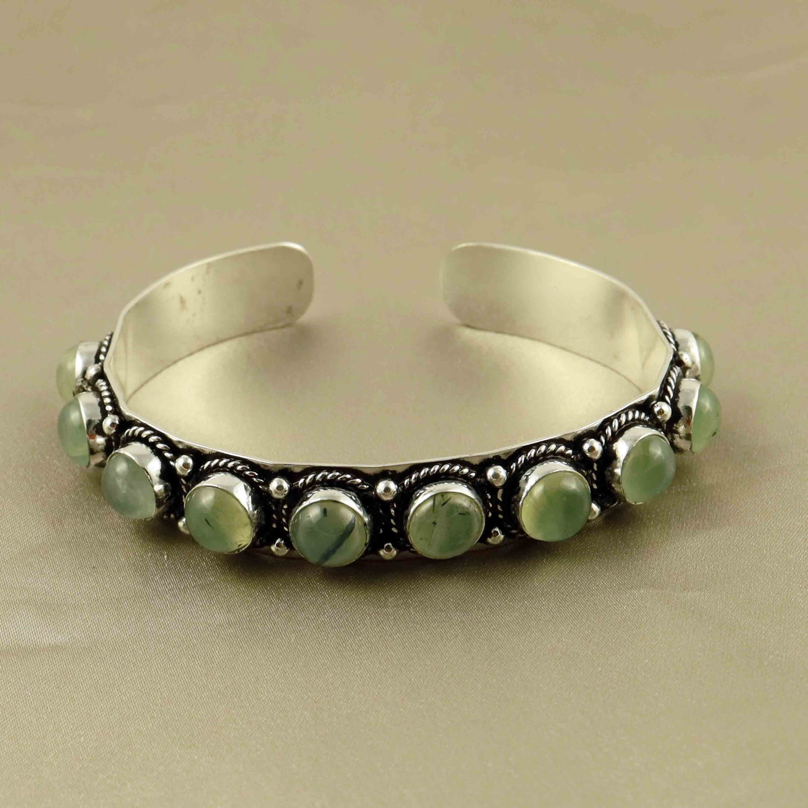 Natural Prehnite Sterling Silver Plated Handmade Cuff Bangle: Product ID: 260607171541 Product - Handmade Silver Plated Cuff Bangle Metal - 92.5 Sterling Silver Plated Bangle Size - 6x5.5 CM (Adjustable) Gemstone - Prehnite Gemstone Origin - South Africa Gemston