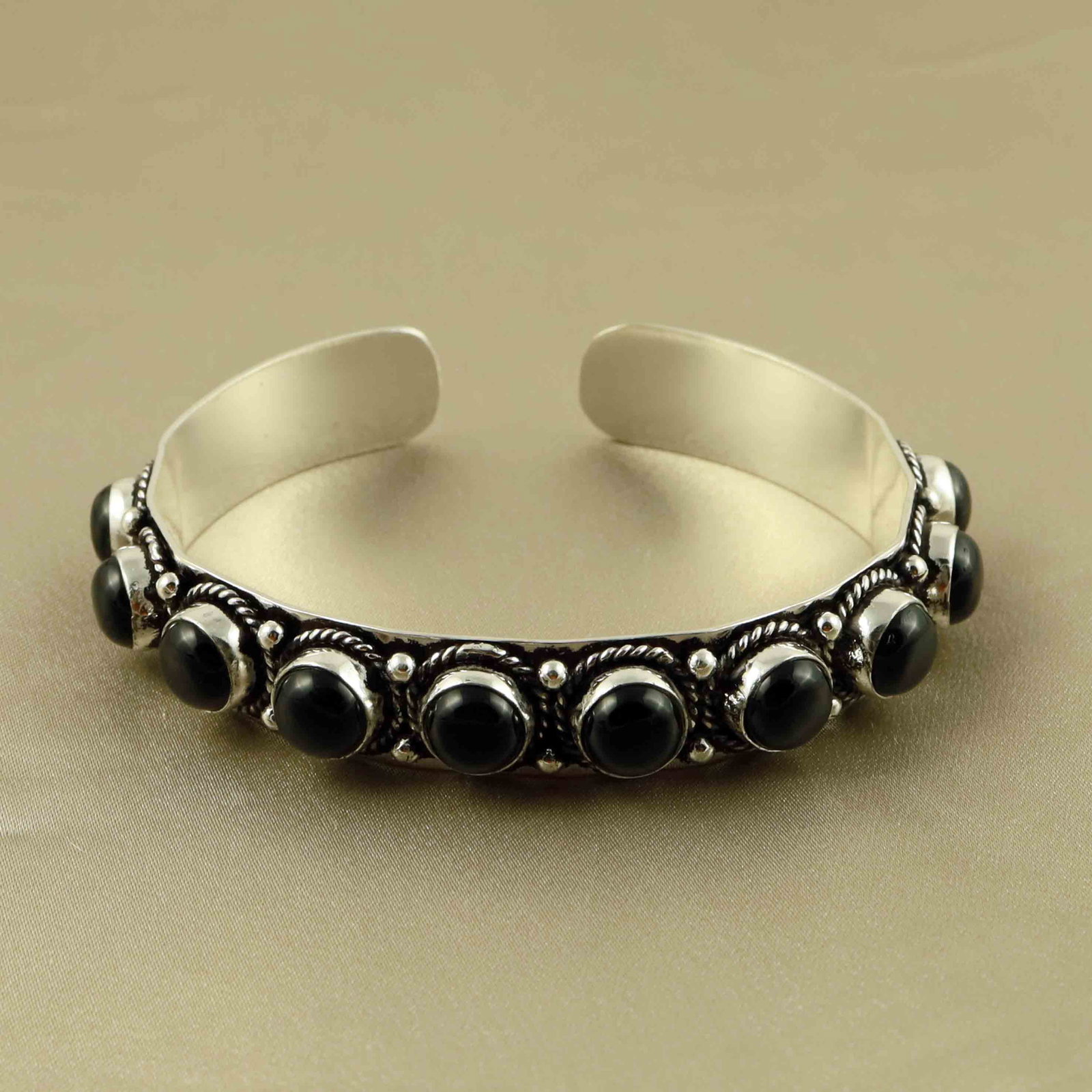 Natural Black Onyx Sterling Silver Plated Handmade Cuff Bangle: Product ID: 260607172343 Product - Handmade Silver Plated Cuff Bangle Metal - 92.5 Sterling Silver Plated Bangle Size - 6.5x5.5 CM (Adjustable) Gemstone - Black Onyx Gemstone Origin - India Gemstone S