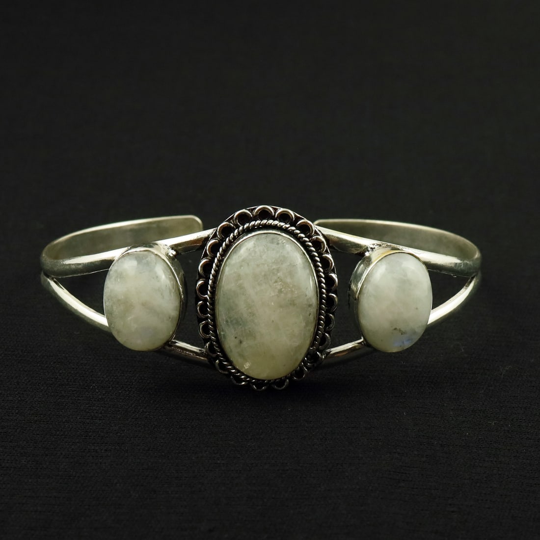 Natural Rainbow Moonstone Sterling Silver Plated Handmade Cuff Bangle: Product ID: 260521153513 Product - Handmade Silver Plated Cuff Bangle Metal - 92.5 Sterling Silver Plated Bangle Size - 7.5x5.5 CM (Adjustable) Gemstone - Rainbow Moonstone Gemstone Origin - India Gem