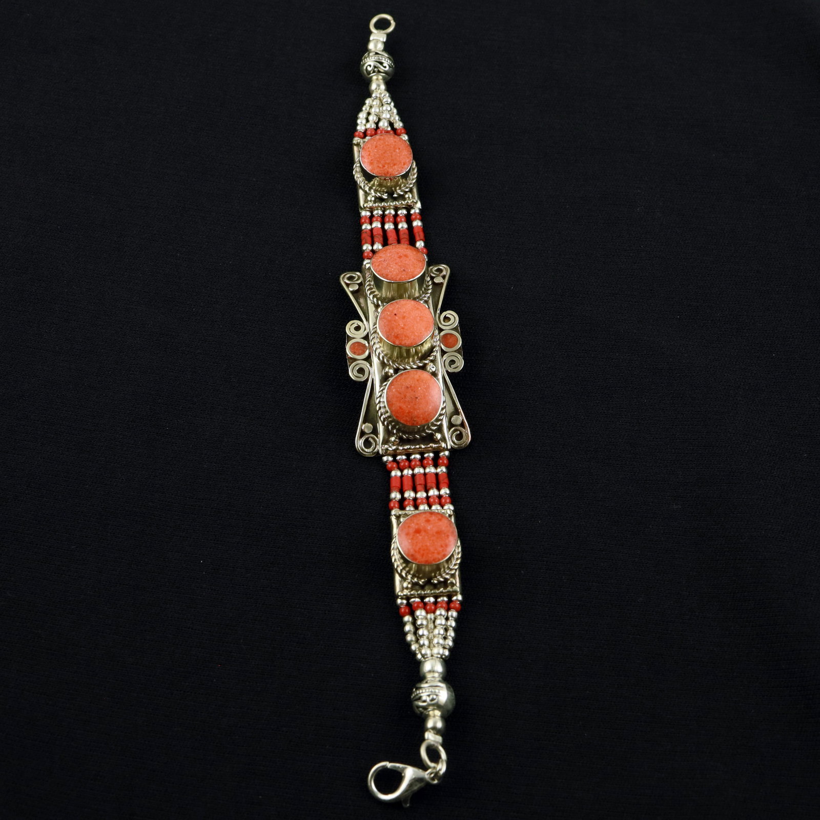 Tibetan Red Coral Handmade Ethnic Royal Bracelet: Product ID: 260520115327 Product - Tibetan Handmade Ethnic Bracelet Gemstone - Natural Red Coral Size - 7 Inch Weight - 50 Gram Approx Metal - Brass & Copper mix Metal Origin - Nepal Country/Region of