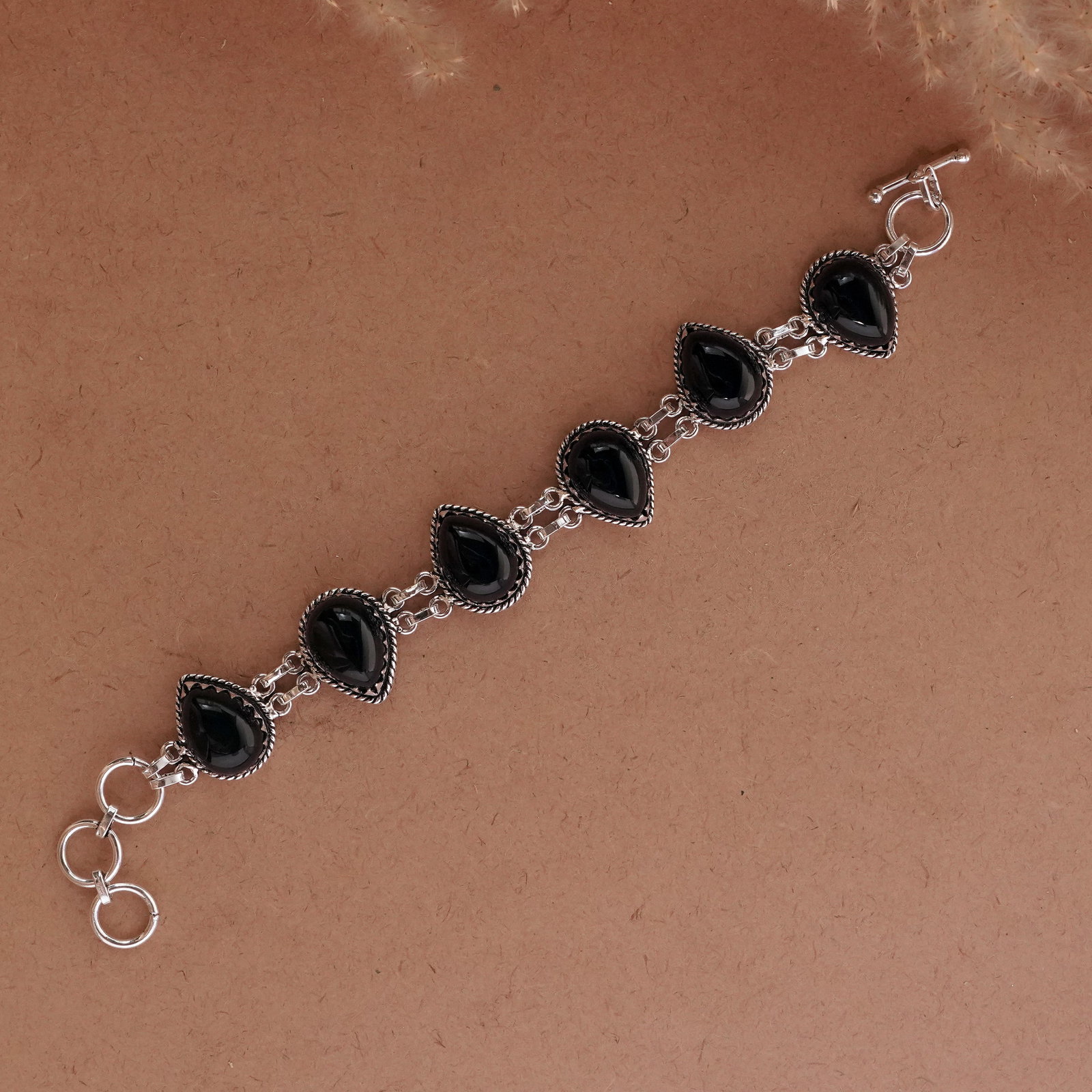 Natural Black Onyx Sterling Silver Plated Handmade Bracelet: Product ID: 260502115104 Product - Handmade Silver Plated Bracelet Metal - 92.5 Sterling Silver Plated Bracelet Length - 6 Inch + 2 Inch Gemstone - Black Onyx Gemstone Size -12X16 ( 6 Stone) Gemstone 