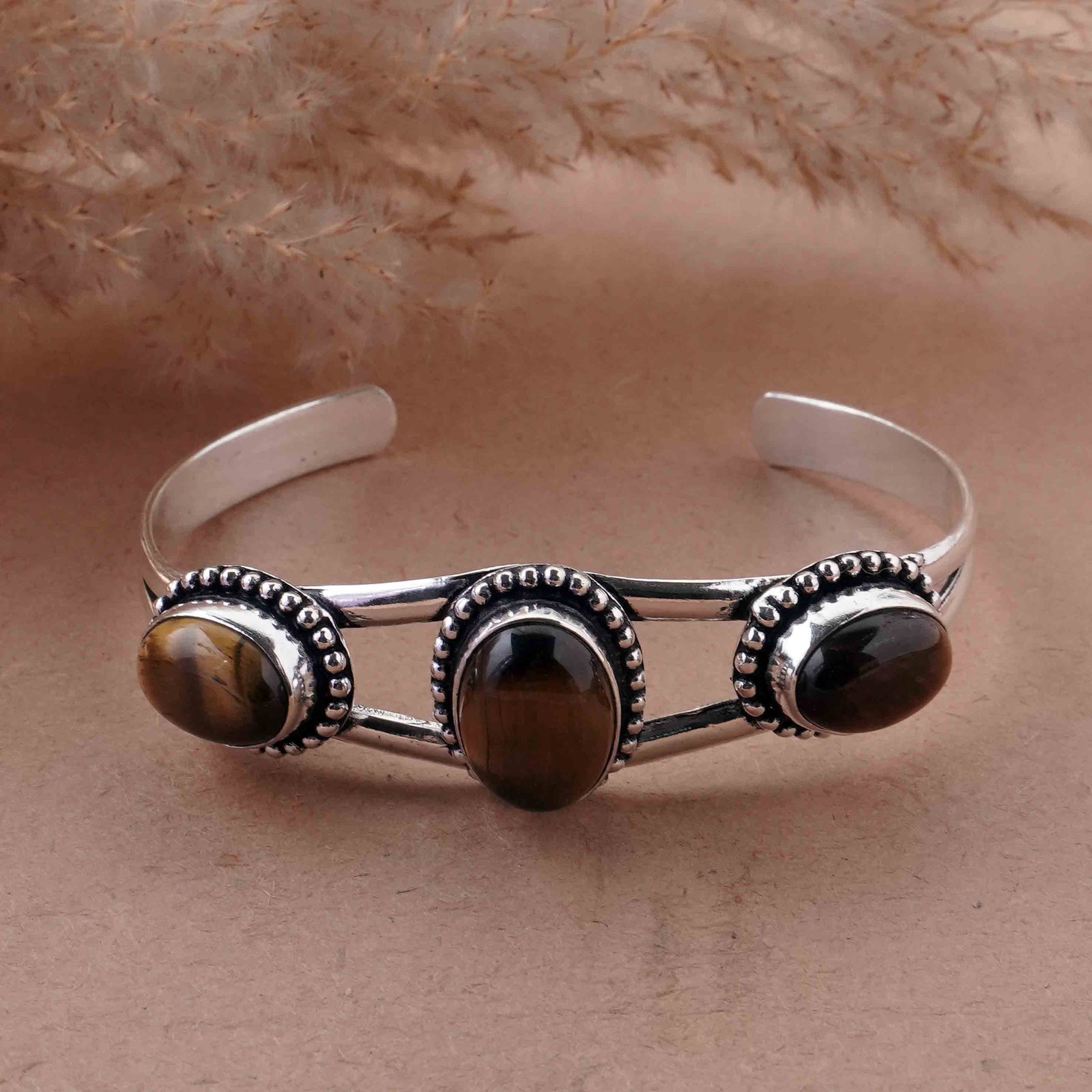 Natural Tiger Eye Sterling Silver Plated Handmade Bangle: Product ID: 260429154643 Product - Handmade Silver Plated Cuff Bangle Metal - 92.5 Sterling Silver Plated Bangle Size - 6.5x4.5 CM (Adjustable) Gemstone - Tiger Eye Gemstone Origin - South Africa Gems