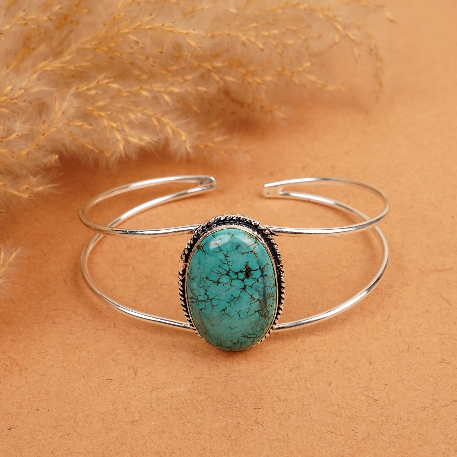 Natural Turquoise Sterling Silver Plated Handmade Cuff Bangle: Product ID: 260412111226 Product - Handmade Silver Plated Cuff Bangle Metal - 92.5 Sterling Silver Plated Bangle Size - 7.5x5.5 CM (Adjustable) Gemstone - Turquoise Gemstone Origin - Tibet Gemstone Si