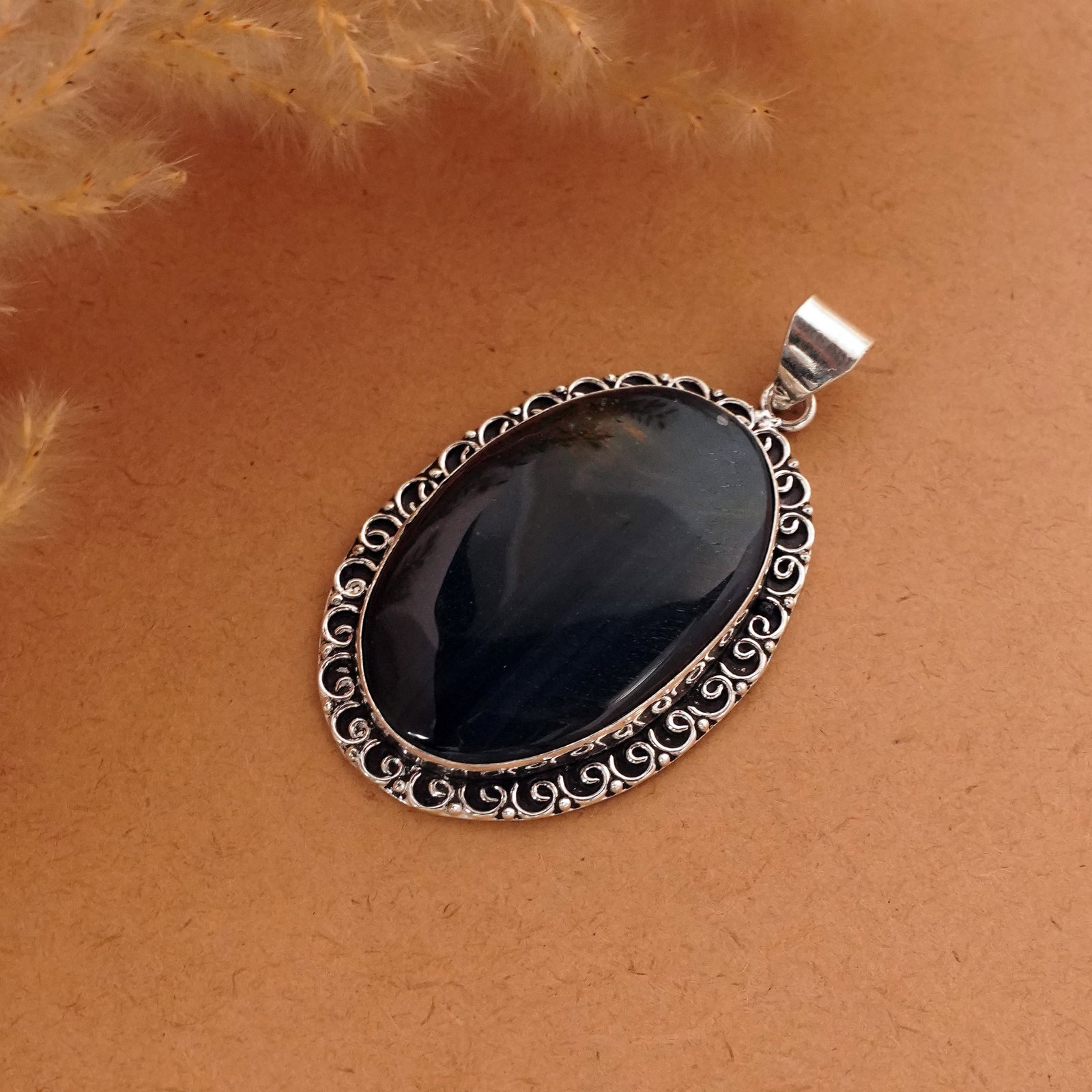 Natural Black Tiger Eye Sterling Silver Plated Handmade Pendant: Product ID: 260411123637 Product - Handmade Silver Plated Pendant Metal - 92.5 Sterling Silver Plated Pendant Size - 5x3.5 CM Gemstone - Black Tiger Eye Gemstone Origin - South Africa Gemstone Shape -