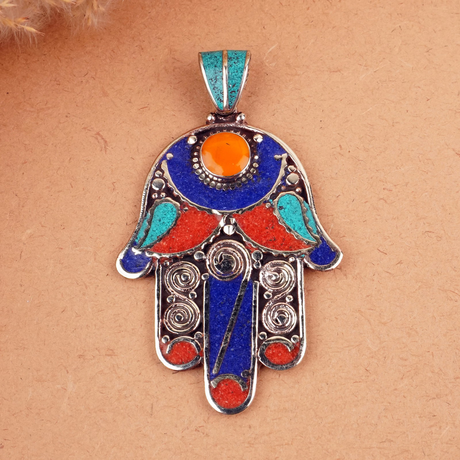 Tibetan Turquoise & Coral Handmade Fatima Hand Pendant: Product ID: 260407150235 Product - Tibetan Handmade Fatima Hand Pendant Gemstone - Natural Turquoise & Coral & Copal & Lapis Pendant Size - 6.5X5 CM Pendant Weight - 24 Gram Metal - Brass & Copper mix