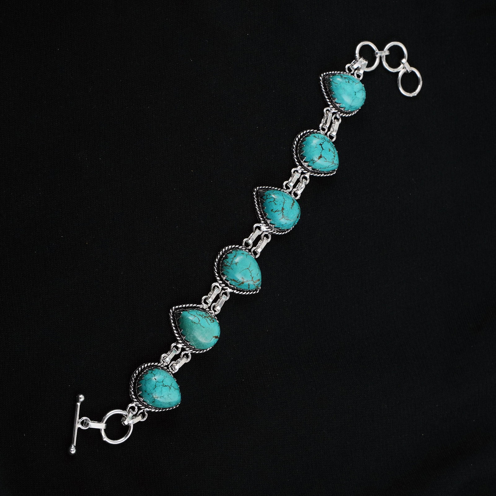 Natural Turquoise Sterling Silver Plated Handmade Bracelet: Product ID: 260403163310 Product - Handmade Silver Plated Bracelet Metal - 92.5 Sterling Silver Plated Bracelet Length - 6 Inch + 2 Inch Gemstone - Turquoise Gemstone Size -12X16 ( 6 Stone) Gemstone O