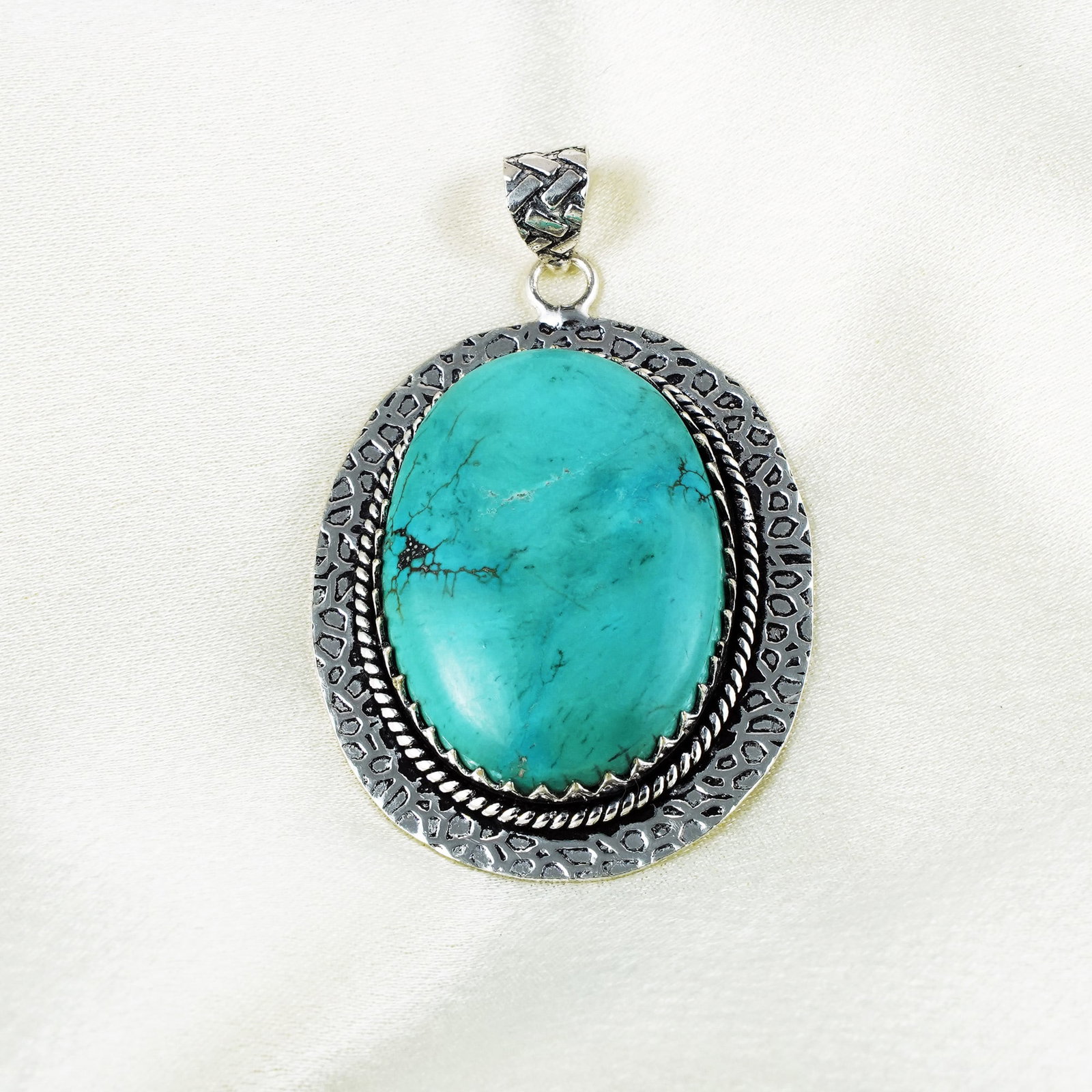 Natural Turquoise Sterling Silver Plated Handmade Pendant: Product ID: 260401133337 Product - Handmade Silver Plated Pendant Metal - 92.5 Sterling Silver Plated Pendant Size - 4.5x3.5 CM Gemstone - Turquoise Gemstone Origin - Tibet Gemstone Shape - Oval Penda