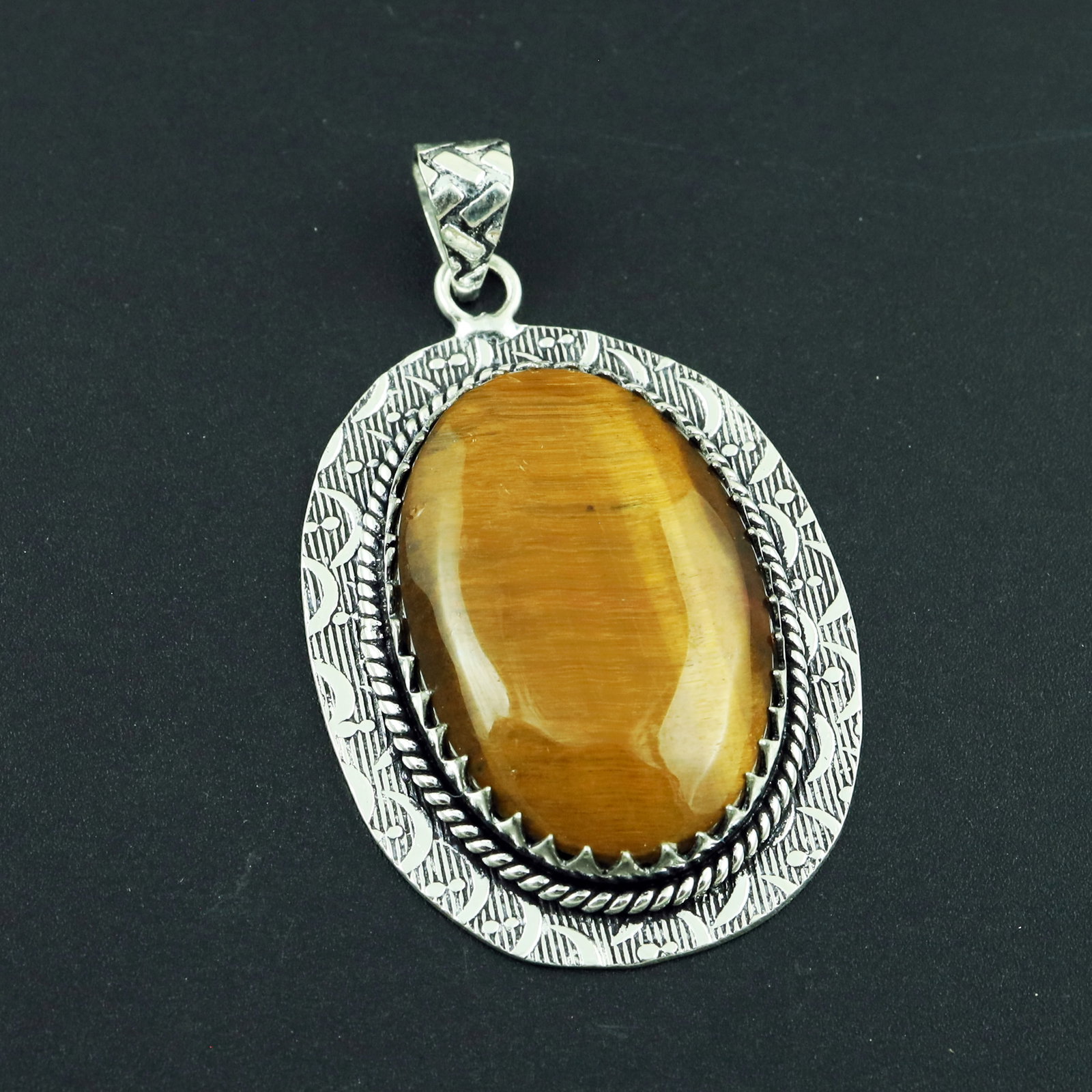 Natural Tiger Eye Sterling Silver Plated Handmade Pendant: Product ID: 260328175316 Product - Handmade Silver Plated Pendant Metal - 92.5 Sterling Silver Plated Pendant Size - 4x3 CM Gemstone - Tiger Eye Gemstone Origin - South Africa Gemstone Shape - Oval Pe