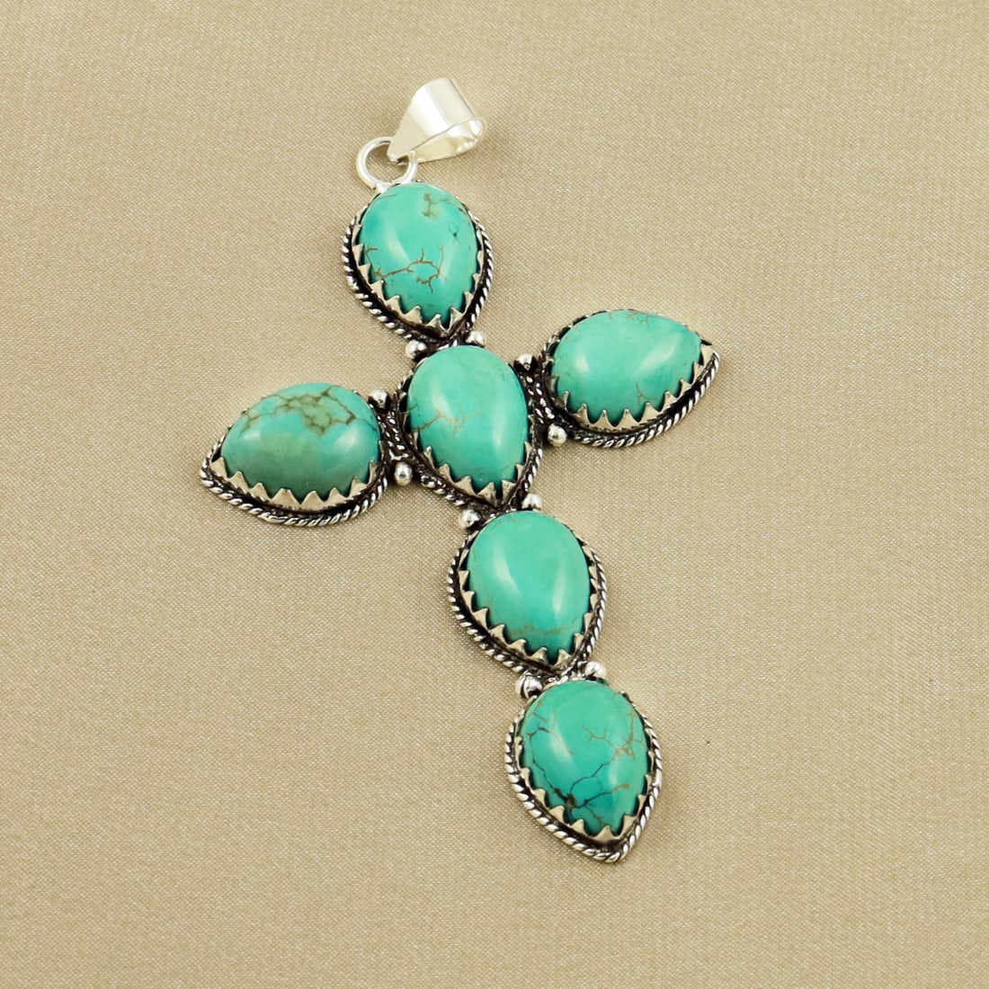 Natural Turquoise Sterling Silver Plated Handmade Cross Pendant: Product ID: 260704120819 Product - Handmade Silver Plated Pendant Metal - 92.5 Sterling Silver Plated Pendant Size - 3.5x2 Inch Gemstone - Turquoise Gemstone Origin - Tibet Gemstone Size - 12x16 MM ( 