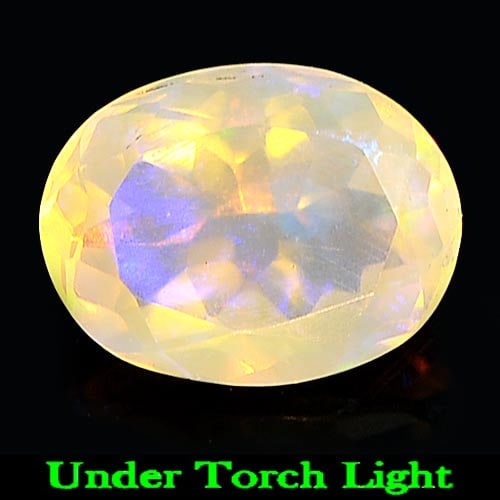 Natural Multi Color Play Of Colour Opal Gemstones 1.22 Ct. Oval Shape 9 x 6.9 Mm.: Product ID: 818725085 Product Name: Natural Opal Weight: 1.22 CT. Size: 9 x 6.9 x 5 MM. Shape: Oval Color: Multi Color Clarity:Semi - Transparent Luster: Iridescent Gems Origin: Ethiopia Treatment: Un