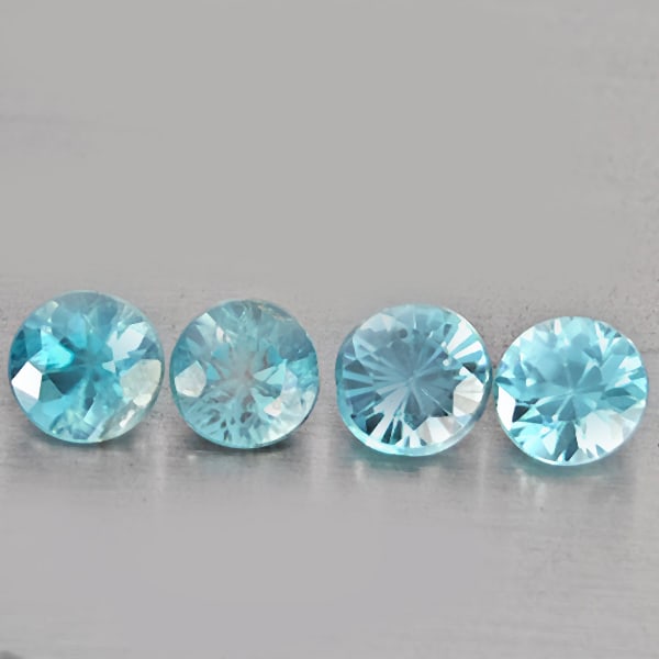 Natural Blue Zircon Gemstones 1.81 Ct. 4 Pcs. Round Diamond Cut 4.4 Mm.: Product ID: 807743256 Product Name: Natural Zircon Weight: 1.81 CT. Size: 4.4 x 4.4 x 3 MM. Shape: Round Diamond Cut Color: Blue Clarity:SI1 Luster: Good Gems Origin: Cambodia Treatment: Heated Crysta