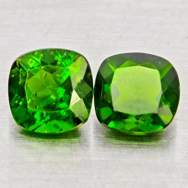 Natural Green Chrome Diopside Gemstones 1.15 Ct. 2 Pcs. Cushion Shape 5.1 Mm.: Product ID: 801608264 Product Name: Natural Chrome Diopside Weight: 1.15 CT. Size: 5.1 x 5.1 x 2.7 MM. Shape: Cushion Shape Color: Green Clarity:SI1 Luster: Good Gems Origin: Russia Treatment: Unheate