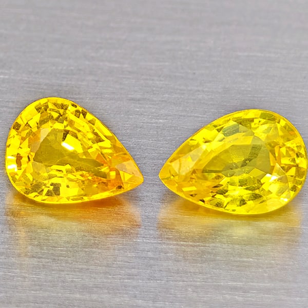 Natural Yellow Sapphire Gemstones 0.73 Ct. 2 Pcs. Pear Shape 5 x 3.8 Mm.: Product ID: 806162760 Product Name: Natural Yellow Sapphire Weight: 0.73 CT. Size: 5 x 3.8 x 2.5 MM. Shape: Pear Shape Color: Yellow Clarity:VSI Luster: Good Gems Origin: Thailand Treatment: Heated Cr