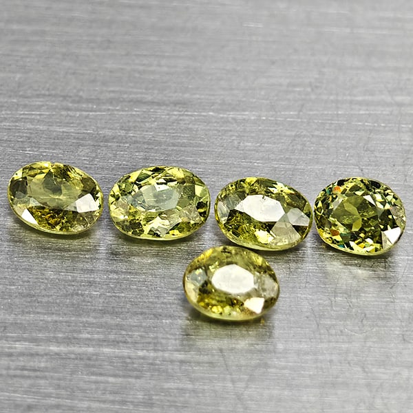 Natural Green Demantiod Garnet Gemstones 1.10 Ct. 5 Pcs. Oval Shape 4 x 3 Mm.: Product ID: 802937605 Product Name: Natural Demantoid Weight: 1.10 CT. Size: 4 x 3 x 2 MM. Shape: Oval Shape Color: Green Clarity:SI1 Luster: Good Gems Origin: Madagascar Treatment: Unheated Crystal S