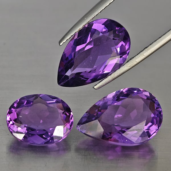 Natural Purple Amethyst Gemstones 10.75 Ct. 3 Pcs. Mixed Shape and Mixed Size: Product ID: 800325695 Product Name: Natural Amethyst Weight: 10.75 CT. Size: 14 x 8.9 x 5.6 to 10.5 x 8.5 x 5.1 MM. Shape: Mixed Shape Color: Purple Clarity:VSI Luster: Good Gems Origin: Brazil Treatm