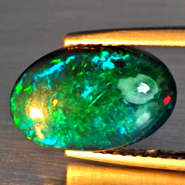 Natural Multi Color Opal Gemstones 2.41 Ct. Oval Cabochon Shape 14.3 x 9.5 Mm. (1 of 3)