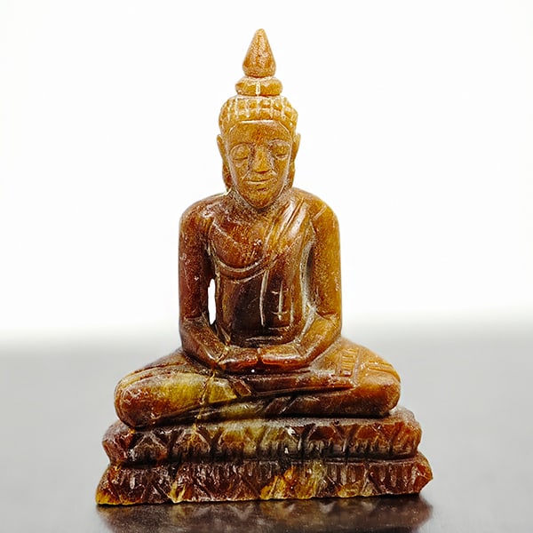 Natural White Brown Petrified Wood 145.62 Ct. Buddha Carved Shape 65 x 47 Mm.: Product ID: 819102204 Product Name: Natural Petrified Wood Weight: 145.62 CT. Size: 65 x 47 x 16 MM. Shape: Buddha Carved Color: White Brown Clarity:Opaque Luster: Good Gems Origin: Thailand Treatment