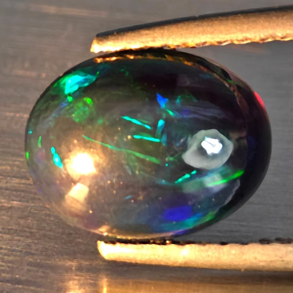 Natural Multi Color Play Of Colour Opal Gemstones 1.61 Ct. Oval Cabochon Shape 10.3 x 8 Mm. (1 of 3)