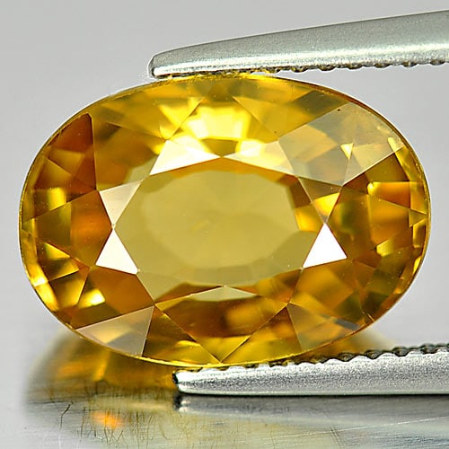 Natural Yellow Zircon Gemstones 7.92 Ct. Oval Shape 12.8 x 9.1 Mm.: Product ID: 807728994 Product Name: Natural Zircon Weight: 7.92 CT. Size: 12.8 x 9.1 x 6 MM. Shape: Oval Color: Yellow Clarity:VVS Luster: Very Good Gems Origin: Cambodia Treatment: Heated Crystal Str
