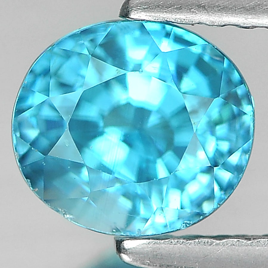 Natural Blue Zircon Gemstones 2.20 Ct. Oval Shape 6.8 x 6.1 Mm.: Product ID: 807720903 Product Name: Natural Zircon Weight: 2.20 CT. Size: 6.8 x 6.1 x 5.3 MM. Shape: Oval Color: Blue Clarity:VVS Luster: Very Good Gems Origin: Cambodia Treatment: Heated Crystal Stru