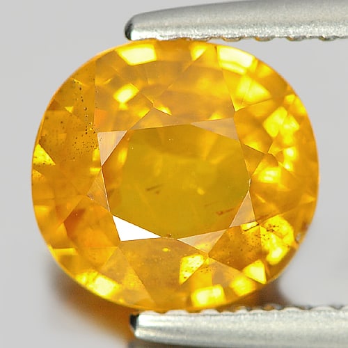 Natural Yellow Sapphire Gemstones 1.98 Ct. Oval Shape 7.7 x 7.3 Mm.: Product ID: 806148079 Product Name: Natural Yellow Sapphire Weight: 1.98 CT. Size: 7.7 x 7.3 x 4 MM. Shape: Oval Color: Yellow Clarity:SI Luster: Good Gems Origin: Thailand Treatment: Heated Crystal S