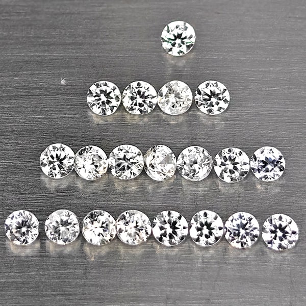 Natural White Zircon Gemstones 0.85 Ct. 20 Pcs. Round Diamond Cut 1.8 Mm.: Product ID: 807743127 Product Name: Natural Zircon Weight: 0.85 CT. Size: 1.8 x 1.8 x 1.3 MM. Shape: Round Diamond Cut Color: White Clarity:VSI Luster: Good Gems Origin: Cambodia Treatment: Heated Cry
