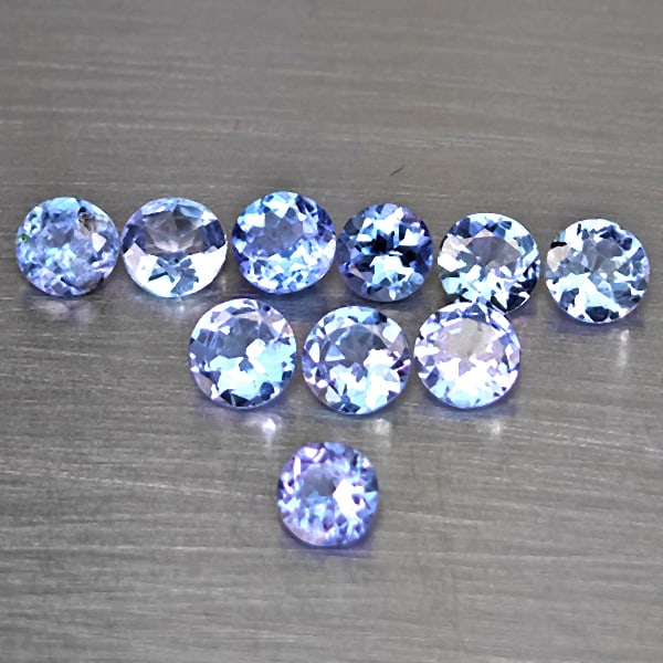 Natural Violetish Blue Tanzanite Gemstones 2.28 Ct. 10 Pcs. Round Shape 4 Mm.: Product ID: 807015066 Product Name: Natural Weight: 2.28 CT. Size: 4 x 4 x 2.5 MM. Shape: Round Color: Violetish Blue Clarity:VSI Luster: Good Gems Origin: Tanzania Treatment: Heated Crystal Structure