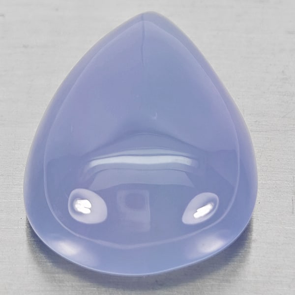 Natural Lavender Chalcedony Gemstones 19.27 Ct. Pear Cabochon Shape 22 x 17.8 Mm.: Product ID: 801502686 Product Name: Natural Chalcedony Weight: 19.27 CT. Size: 22 x 17.8 x 7.9 MM. Shape: Pear Cabochon Color: Lavender Clarity:Semi - Transparent Luster: Good Gems Origin: Russia Trea