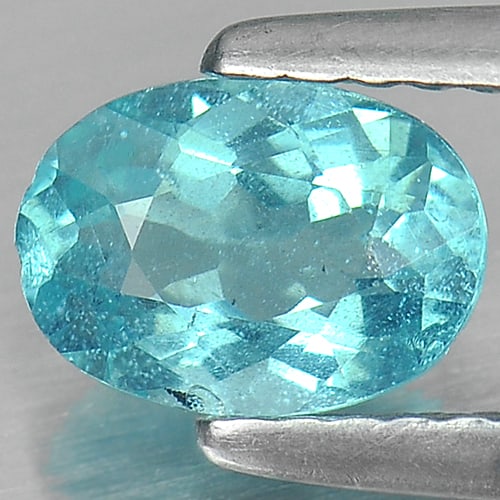 Natural Paraiba Color Apatite Gemstones 0.82 Ct. Oval Shape 7.1 x 5.1 Mm.: Product ID: 800606305 Product Name: Natural Apatite Weight: 0.82 CT. Size: 7.1 x 5.1 x 3.3 MM. Shape: Oval Color: Neon Blue Clarity:SI Luster: Good Gems Origin: Tanzania Treatment: Unheated Crystal St