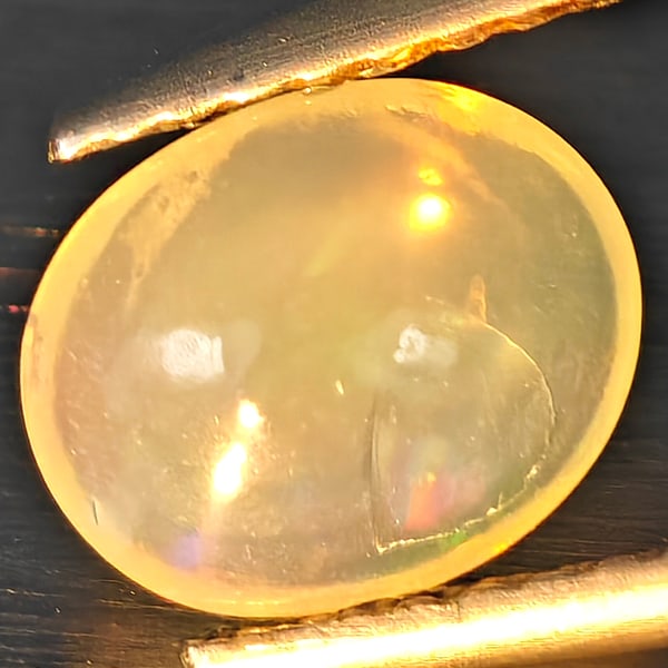Natural Multi Color Opal Gemstones 0.76 Ct. Oval Cabochon Shape 7.8 x 6.4 Mm. (1 of 3)