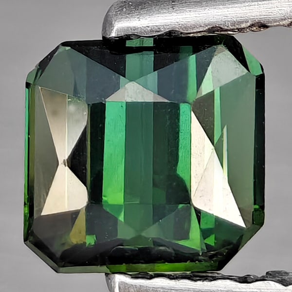 Natural Green Tourmaline Gemstones 0.78 Ct. Octagon Shape 5 x 4.9 Mm.: Product ID: 807251638 Product Name: Natural Tourmaline Weight: 0.78 CT. Size: 5 x 4.9 x 4 MM. Shape: Octagon Color: Green Clarity:SI1 Luster: Good Gems Origin: Nigeria Treatment: Unheated Crystal Stru