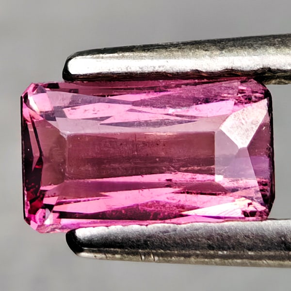 Natural Party Color Pink Tourmaline Gemstones 0.57 Ct. Octagon Shape 6.1 x 3.7 Mm.: Product ID: 807250517 Product Name: Natural Tourmaline Weight: 0.57 CT. Size: 6.1 x 3.7 x 2.8 MM. Shape: Octagon Color: Party Color Pink Clarity:VSI Luster: Good Gems Origin: Nigeria Treatment: Unheat
