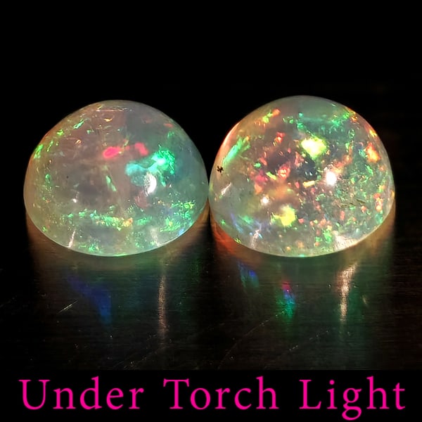 Natural Multi Color Opal Gemstones 1.79 Ct. 2 Pcs. Round Cabochon Shape 7 Mm.: Product ID: 818728218 Product Name: Natural Opal Weight: 1.79 CT. Size: 7 x 7 x 4 MM. Shape: Round Color: Multi-Color Clarity:Semi - Transparent Luster: Good Gems Origin: Ethiopia Treatment: Unheated 