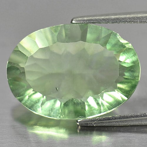 Natural Green Fluorite Gemstones 10.95 Ct. Oval Concave Cut 18.1 x 13 Mm. (1 of 3)