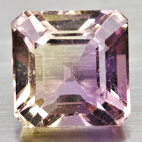 Natural Bi Color Ametrine Gemstones 1.29 Ct. Octagon Shape 6.3 x 6.3 Mm.: Product ID: 100401908 Product Name: Natural Ametrine Weight: 1.29 CT. Size: 6.3 x 6.3 x 4.8 MM. Shape: Octagon Color: Bi Color Clarity:IF Luster: Good Gems Origin: Brazil Treatment: Unheated Crystal S