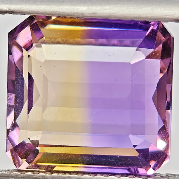 Natural Bi Color Ametrine Gemstones 5.77 Ct. Octagon Shape 11 x 10.3 Mm.: Product ID: 800408603 Product Name: Natural Ametrine Weight: 5.77 CT. Size: 11 x 10.3 x 6.8 MM. Shape: Octagon Color: Bi Color Clarity:VSI Luster: Good Gems Origin: Bolivia Treatment: Unheated Crystal