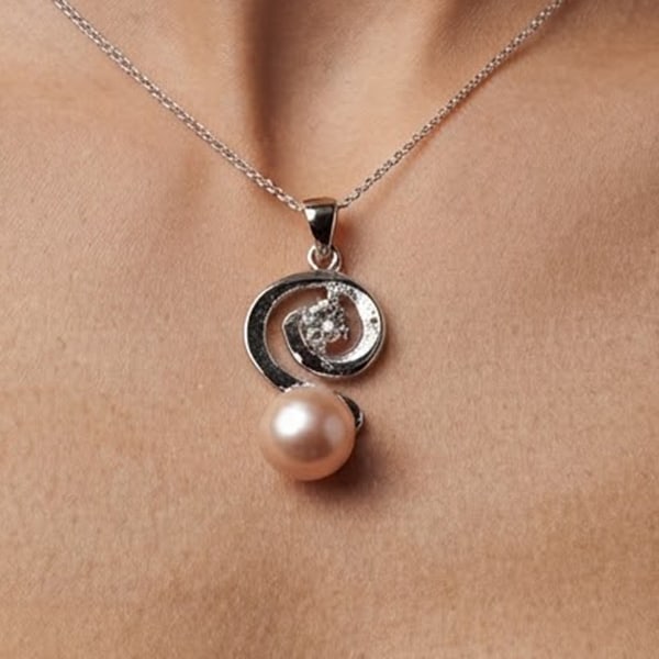 Natural Peach Pearl with Rhodium Pendant Silver Plated 3.54 Grams: Product ID: 805206209 Product Type: 925 Sterling Silver Fine Jewelry Jewelry Weight: 3.54 Grams. Gemstones Color: Peach Metal: Solid Silver 92.5%. Gemstone Detail: Center: Round Cabochon Natural Peach