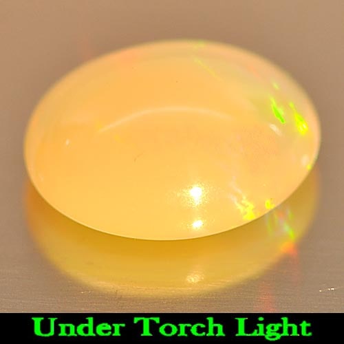 Natural Multi Color Play Of Colour Opal Gemstones 1.08 Ct. Oval Cabochon Shape 8.9 x 7 Mm.: Product ID: 818725549 Product Name: Natural Opal Weight: 1.08 CT. Size: 8.9 x 7 x 4.3 MM. Shape: Oval Cabochon Color: Multi-Color Clarity:Semi - Transparent Luster: Iridescent Gems Origin: Ethiopia Tr
