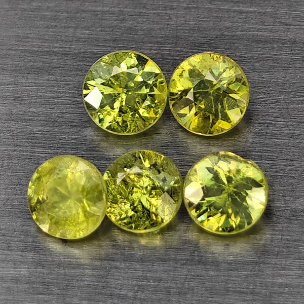 Natural Green Demantiod Garnet Gemstones 0.78 Ct. 5 Pcs. Round Diamond Cut 3.3 Mm.: Product ID: 802937699 Product Name: Natural Demantoid Weight: 0.78 CT. Size: 3.3 x 3.3 x 2 MM. Shape: Round Diamond Cut Color: Green Clarity:SI1 Luster: Good Gems Origin: Madagascar Treatment: Unheate