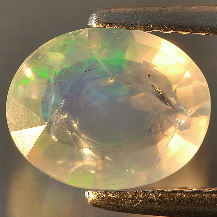 Natural Multi Color Opal Gemstones 1.37 Ct. Oval Shape 9 x 7.3 Mm. (1 of 3)