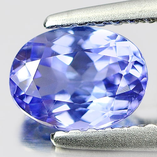 Natural Blue Tanzanite Gemstones 1.01 Ct. Oval Shape 7.1 x 5.3 Mm.: Product ID: 807004646 Product Name: Natural Tanzanite Weight: 1.01 CT. Size: 7.1 x 5.3 x 3.6 MM. Shape: Oval Color: Blue Clarity:VSI Luster: Good Gems Origin: Tanzania Treatment: Heated Crystal Struct