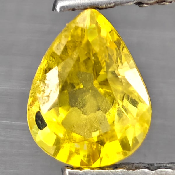 Natural Yellow Sapphire Gemstones 0.75 Ct. Pear Shape 6.3 x 4.8 Mm.: Product ID: 806130472 Product Name: Natural Yellow Sapphire Weight: 0.75 CT. Size: 6.3 x 4.8 x 3.4 MM. Shape: Pear Shape Color: Yellow Clarity:SI1 Luster: Good Gems Origin: Thailand Treatment: Heated 