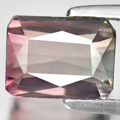 Natural Bi Color Tourmaline Gemstones 3.33 Ct. Octagon Shape 8.9 x 6.7 Mm.: Product ID: 807238040 Product Name: Natural Tourmaline Weight: 3.33 CT. Size: 8.9 x 6.7 x 5.5 MM. Shape: Octagon Color: Bi Color Clarity:VSI Luster: Good Gems Origin: Nigeria Treatment: Unheated Cryst