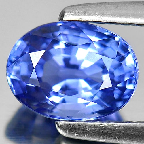 Natural Violetish Blue Tanzanite Gemstones 1.17 Ct Clean Oval Shape 6.92 x 5.19 Mm.: Product ID: 107001108 Product Name: Natural Tanzanite Weight: 1.17 CT. Size: 6.92 x 5.19 x 4.26 MM. Shape: Oval Color: Blue Clarity:IF Luster: Very Good Gems Origin: Tanzania Treatment: Heated Crystal