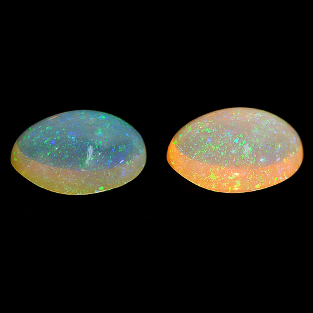 Natural Opal Multi Color Gemstones 2.24 Ct. Oval Cabochon 11.7 x 8.3 Mm.: Product ID: 818727480 Product Name: Natural Opal Weight: 2.24 CT. Size: 11.7 x 8.3 x 5.3 MM. Shape: Oval Cabochon Color: Multi-Color Clarity:Semi - Transparent Luster: Iridescent Gems Origin: Ethiopia