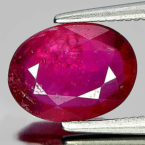 Natural Purplish Red Ruby Gemstones 1.87 Ct. Oval Shape 9.4 x 7.1 Mm.: Product ID: 805928602 Product Name: Natural Ruby Weight: 1.87 CT. Size: 9.4 x 7.1 x 2.7 MM. Shape: Oval Color: Purplish Red Clarity:VSI Luster: Good Gems Origin: Madagascar Treatment: Heated (Lead-gla