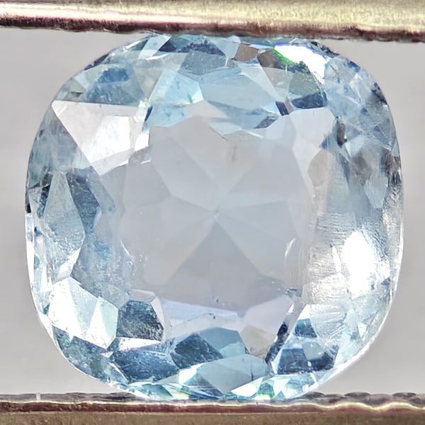 Natural Light Blue Aquamarine Gemstones 1.26 Ct. Cushion Shape 7 Mm.: Product ID: 800812399 Product Name: Natural Aquamarine Weight: 1.26 CT. Size: 7 x 7 x 4 MM. Shape: Cushion Shape Color: Light Blue Clarity:VSI - SI1 Luster: Good Gems Origin: Brazil Treatment: Unheate