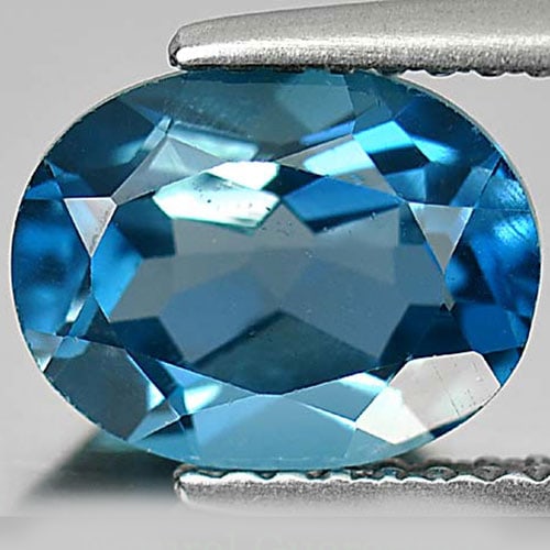 Natural London Blue Topaz Gemstones 2.41 Ct. Oval Shape 9 x 7 x 4.8 Mm.: Product ID: 807163049 Product Name: Natural Blue Topaz Weight: 2.41 CT. Size: 9 x 7 x 4.8 MM. Shape: Oval Color: Blue Clarity:VVS Luster: Very Good Gems Origin: Brazil Treatment: Treated Crystal Struc
