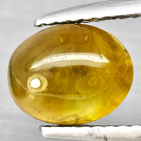 Natural Yellowish Green Cats Eye Apatite Gemstones 2.82 Ct. Oval Cabochon Shape 8.4 x 7 Mm.: Product ID: 800613807 Product Name: Natural Apatite Weight: 2.82 CT. Size: 8.4 x 7 x 5.8 MM. Shape: Oval Cabochon Color: Yellowish Green Clarity:Semi - Transparent Luster: Good Gems Origin: Tanzania T